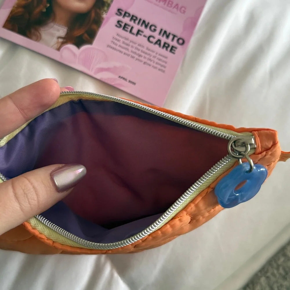 NWT April Ipsy Glam Bag! Orange Quilted Pouch with Blue Flower Charm